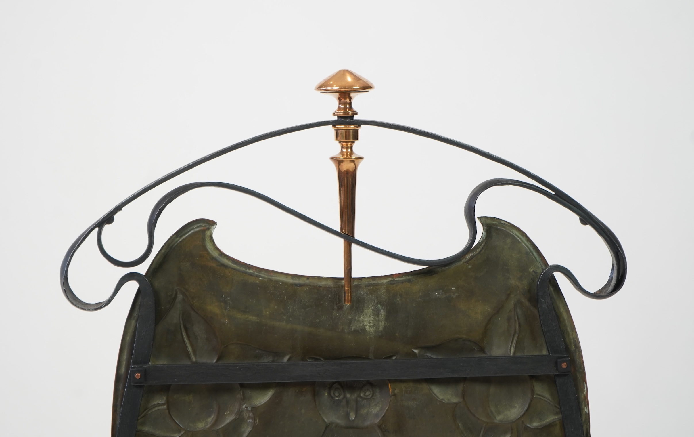 An Arts and Crafts copper and wrought iron fire screen